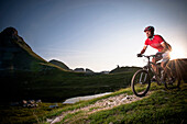 Mountain biker off-roading, Styria, Austria
