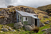 Wellblech Hütte,Wanderhütte,Schutzhütte einer Farm auf Banks Peninsula,Banks Peninsula,Canterbury,Südinsel,Neuseeland