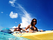 Couple in a kayak, Bora Bora, Society Islands, French Polynesia, Windward Islands, South Pacific