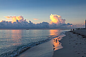 Morning impression on the beach with thunderstorm clouds, South Beach, Miami, Florida, USA