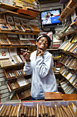 Woman selling cigars in a tobacco shop on Duval Street, Key West, Florida Keys, USA