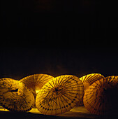 Thailand, Oriental umbrellas, golden colors, black background