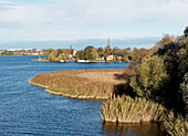 River Havel with church in Geltow, Land Brandenburg, Germany