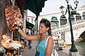 Young woman shopping, Rialto bridge in the background, Grand Canal, Venice, Venezia, Italy, Europe