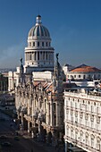 Cuba, Havana, elevated city view towards the Capitolio Nacional, morning with El Teatro de La Habana theater, morning