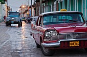 Cuba, Sancti Spiritus Province, Trinidad, 1950s-era US-made Plymouth taxi