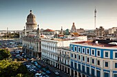 Cuba, Havana, Havana Vieja, the Capitolio Nacional and buildings by the Parque Central, elevated view, dusk