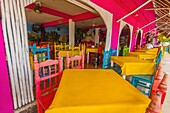 A colorful open air restaurant in the town of Tulum, Riviera Maya, Mexico