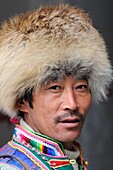 China, Sichuan, Kham, Danba, Khampa wearing a fur cap