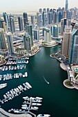 Skyscrapers and yachts in Dubai Marina  Dubai city  Dubai  United Arab Emirates