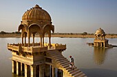 shrines in Gadi Sagar, the tank was once the water supply of the city and is surrounded by small temples and shrines, Jaisalmer,Rajasthan, India