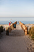 Family at Baltic Sea beach near Rerik, Mecklenburg-Western Pomerania, Germany