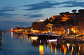 Illuminated marina at the Bruna river mouth, Castiglione della Pescaia, seaside town, Mediterranean Sea, province of Grosseto, Tuscany, Italy, Europe