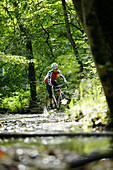 Man cyclocross touring in autumn, Oberambach, Munsing, Bavaria, Germany