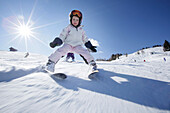 Girl (4 years) downhill skiing, Hermagor, Carinthia, Austria