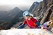 Young woman climbing, Skywalk, Dachstein mountains, Styria, Austria