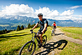 Two mountain bikers off-roading, Duisitzkar, Planai, Styria, Austria