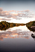 BRAZIL, Agua Boa, Amazon, Agua Boa River, sunset on the river deep in the Amazon jungle