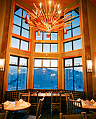 CANADA, interior of illuminated restaurant at the top of Kicking Horse Ski Resort
