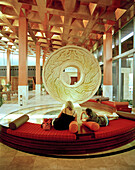 MEXICO, Maya Riviera, tourist sitting in a hotel lobby, Iberostar