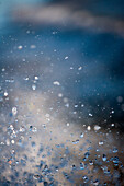 MEXICO, Baja Sur, water drops fly through the air from the motor of a fishing boat, Magdalena Bay