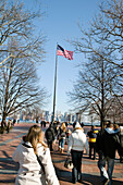 USA, New York, tourists walking around Liberty Island, Statue of Liberty National Monument