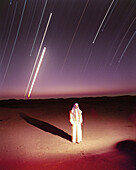 SAUDI ARABIA, man in the desert at night under the stars, The Empty Quarter, Najran