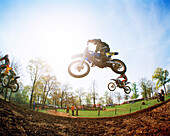 USA, Tennessee, motocross riders getting air in a race