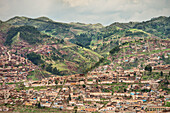 View of houses located on hills in Cusco, Cuzco, Peru, Andes, South America
