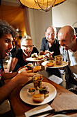 Chefs of mobile kitchen unit 'Kitchen Guerilla' at restaurant Klippkroog, Grosse Bergstrasse, Altona, Hamburg, Germany