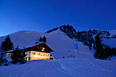 Schoenfeldhuette, illuminated at night with Jaegerkamp in the background, Schoenfeldhuette, Spitzing area, Bavarian Alps, Upper Bavaria, Bavaria, Germany