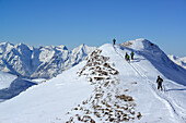 Group of backcountry skiers ascending to Hoher Kopf, Tux Alps, Tyrol, Austria