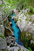 View to river Soca between rocks, Alpe-Adria-Trail, Tolmin, Slovenia
