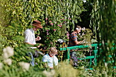 Group of painters in Claude Monet's gardens, Giverny, Seine-Maritime, Upper-Normandy, France
