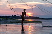 South America ,Brazil, Amazonas state, Manaus, Amazon river basin, along Rio Negro, fisherman on Rio Negro