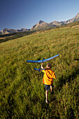 Boy with Glider Plane in Field, Pincher Creek Alberta