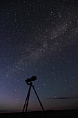Camera for stargazing with Milky Way overhead, Grasslands National Park, Saskatchewan