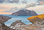 Sunset on North Coast of Labrador with Arctic cruise ship in the background, Killinet Island, Torngat Mountains National Park Reserve, Newfoundland & Labrador