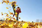 Girl Kicking Leaves, Aurora, Ontario