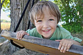 Boy Playing on Swing, Uxbridge, Ontario