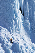 Ice Climber on The Weeping Wall, Icefields Parkway, Banff National Park, Alberta