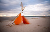 Tepee cover blowing in wind, Grand Beach, Manitoba