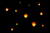 Lampions flying in the dark sky