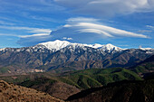 Lenticular cloud formation over Mt Canigou,  Eastern Pyrenees, France