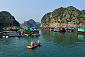 Floating village in Halong Bay, North Vietnam, South East Asia, Asia