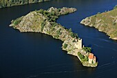 France, Loire (42), Lake Grangent, Grangent Castle is located on an island in the lake, it is a historical monument, the right bank of the lake is protected by the Regional Nature Reserve Saint-Étienne - Gorges de la Loire, (aerial photo)