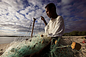 Republic of Madagascar, Diana Region, Diego Suarez By, fisherman with his fishing nets