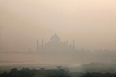 Taj Mahal in the mist Agra. India.