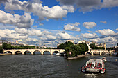 France, Paris, Seine river, Pont Neuf bridge, sightseeing boat