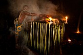 'Africa, Gabon, Mboka A Nzambe village, Bwiti ceremonies, Forest, in the sanctuary called ''god's village'', healing rituals are made at night, the smoke purifies the sick people lying on a table named the ''traditional scanner'' !'